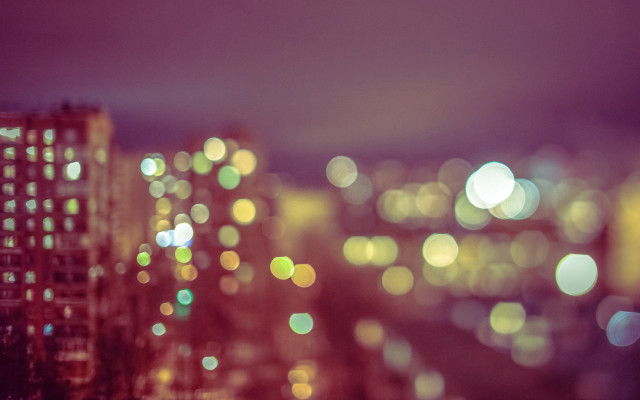 Blurry city night lights buildings free wallpaper for desktop - medium preview image