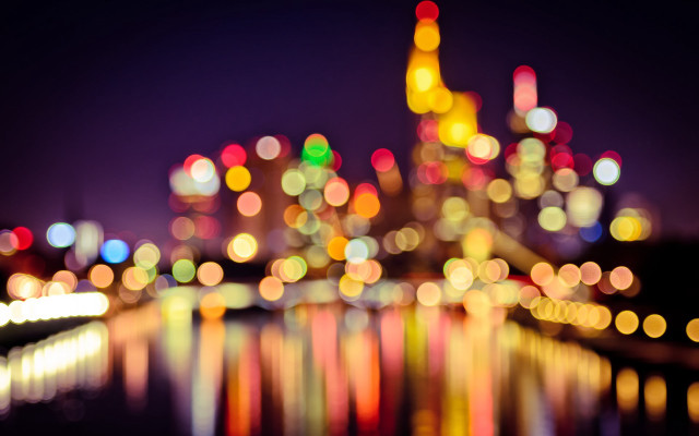 Blurry city night lights reflection free wallpaper for desktop - medium preview image