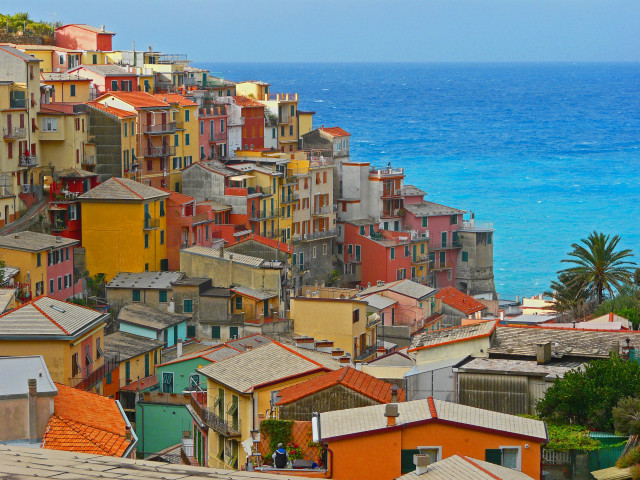 Colorful hillside ocean buildings people free wallpaper for desktop - medium preview image