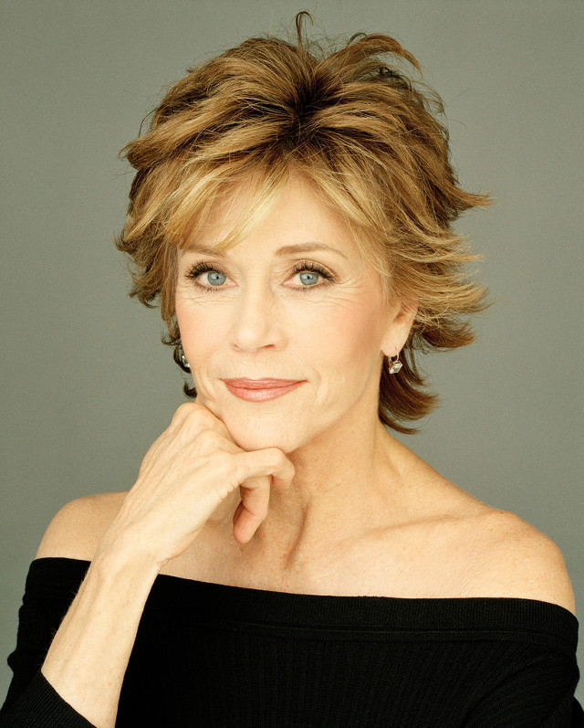 Woman short hair black top free wallpaper for mobile - medium preview image