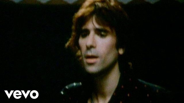 Long haired man microphone dark free wallpaper for desktop - medium preview image