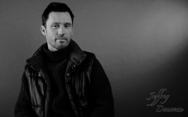 Man black jacket posing light free wallpaper for desktop - medium preview image