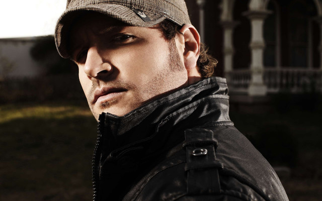 Man hat jacket looking house free wallpaper for desktop - medium preview image