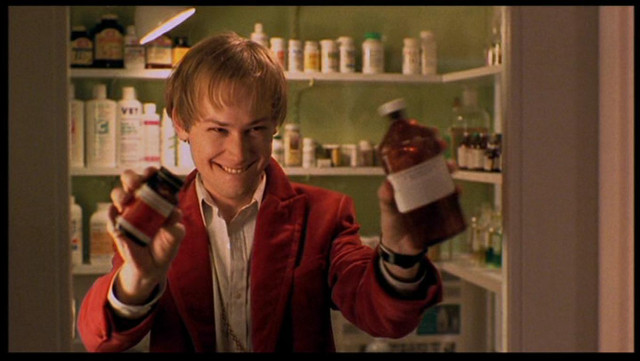 Man holding bottle pharmacy shelves free wallpaper for desktop - medium preview image