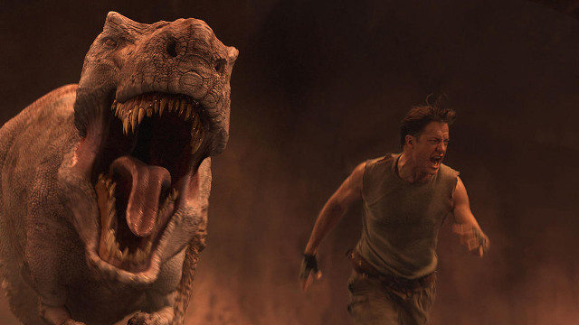 Man running dinosaur cave huge free wallpaper for desktop - medium preview image