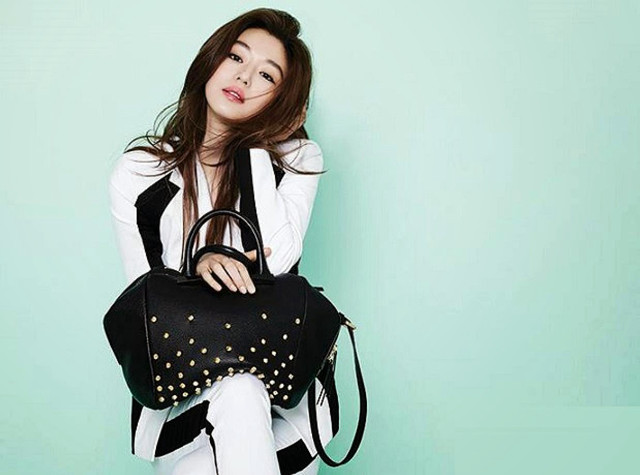 Woman sitting chair holding purse free wallpaper for desktop - medium preview image