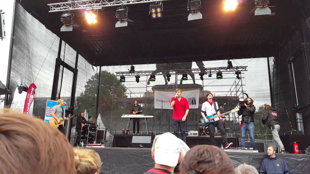 People stage microphones band performance free wallpaper for desktop - medium preview image