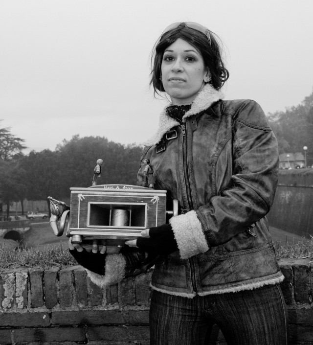 Woman holding small box clock free wallpaper for tablet - medium preview image