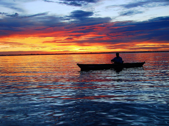 Man boat lake sunset sky free wallpaper for desktop - medium preview image