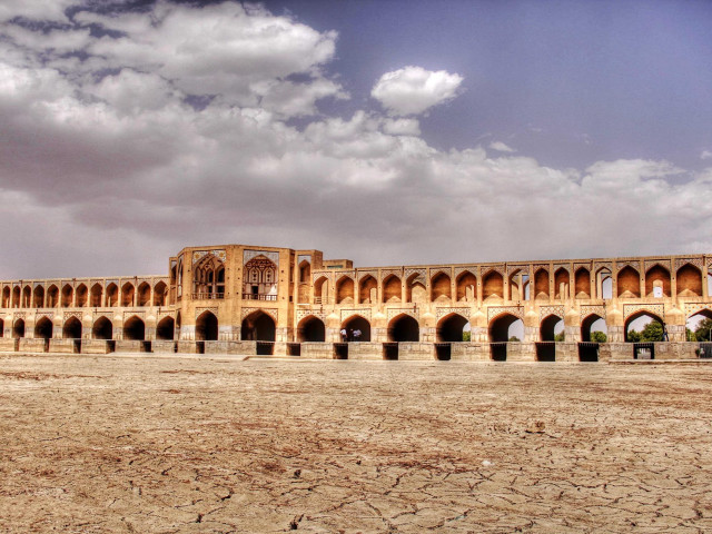 Large building arches sky clouds free wallpaper for desktop - medium preview image