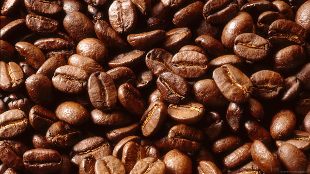 Coffee beans brown background spots free wallpaper for desktop - medium preview image