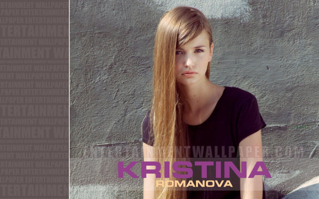 Girl longhair wall posing fashion free wallpaper for desktop - medium preview image