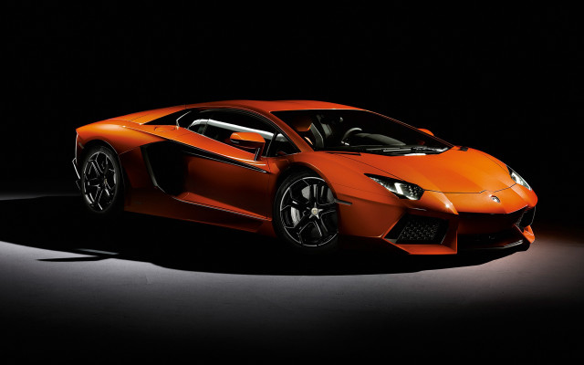 Orange sports car dark room #16 free wallpaper for desktop - medium preview image