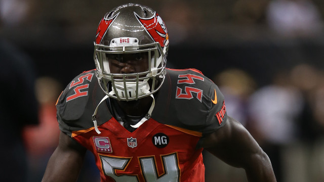 Football player helmet looking down free wallpaper for desktop - medium preview image