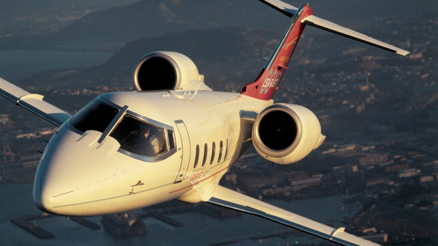 Large white airplane city water free wallpaper for desktop - medium preview image