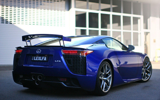 Blue sports car garage window free wallpaper for desktop - medium preview image