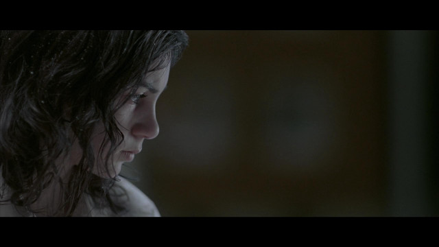 Woman wet hair dark room free wallpaper for desktop - medium preview image