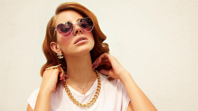 Woman sunglasses necklace pose marble free wallpaper for desktop - medium preview image