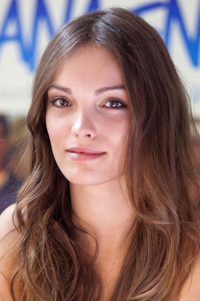 Woman long hair white shirt #3 free wallpaper for mobile - medium preview image