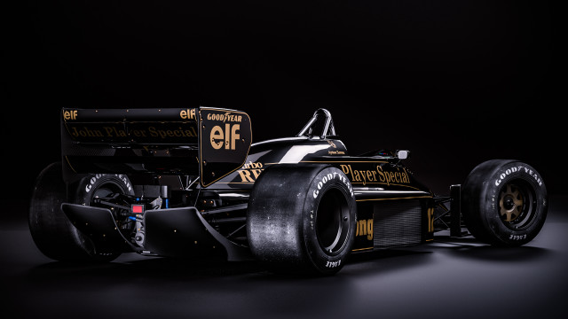 Black yellow racecar frontwheel detailed free wallpaper for desktop - medium preview image