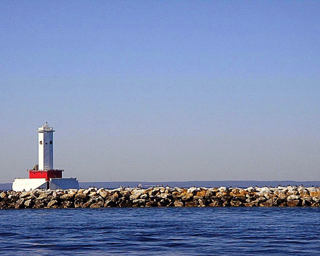 Lighthouse rock wall ocean boat free wallpaper for desktop - medium preview image