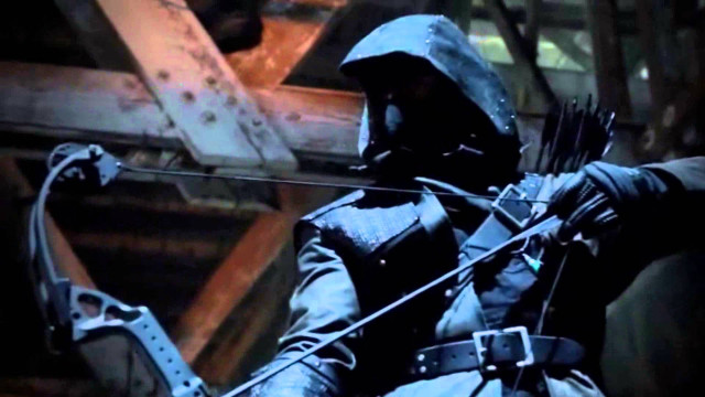 Man hooded outfit bow arrow free wallpaper for desktop - medium preview image