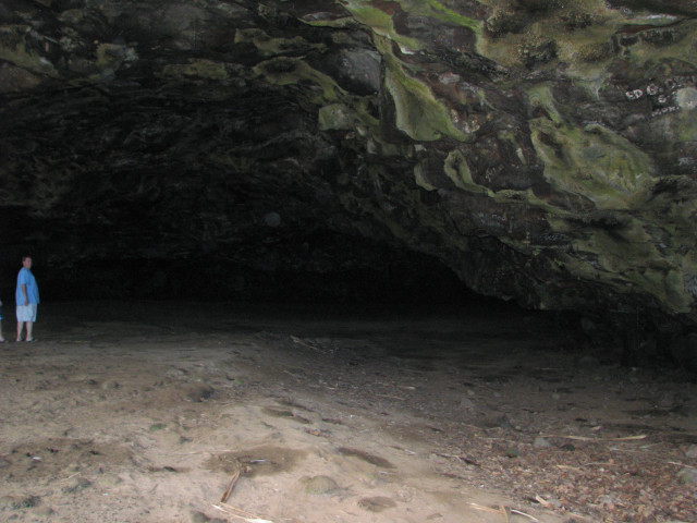 Person standing cave blue coat free wallpaper for desktop - medium preview image