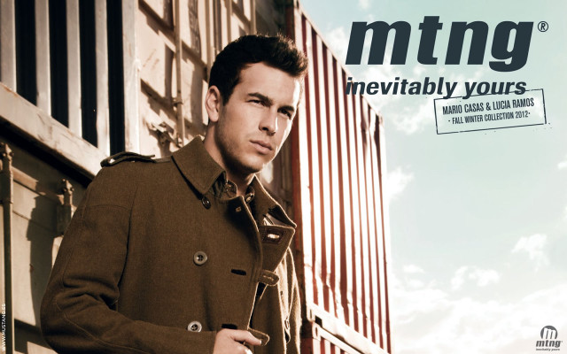 Man trench coat leaning building free wallpaper for desktop - medium preview image