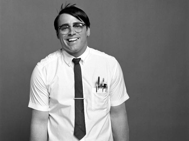 Man smiling glasses gray background free wallpaper for desktop - medium preview image