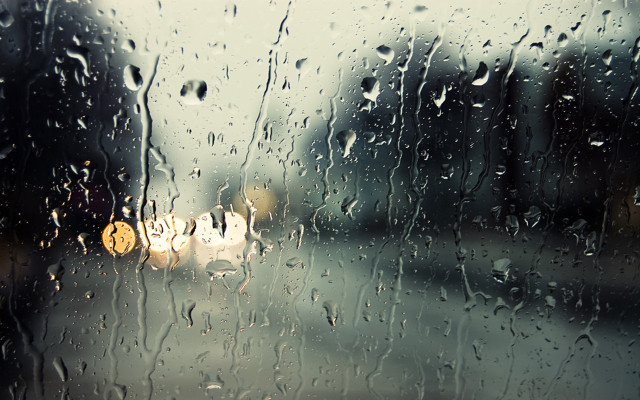 Rain covered window yellow traffic free wallpaper for desktop - medium preview image