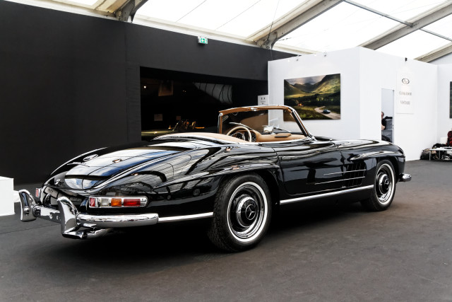 Black car garage white wall #2 free wallpaper for desktop - medium preview image