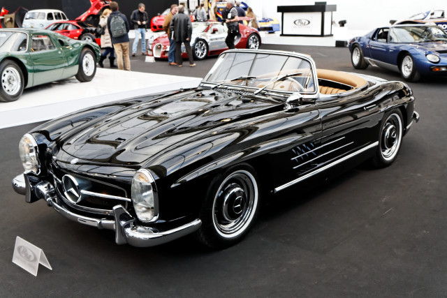 Black car show people background free wallpaper for desktop - medium preview image