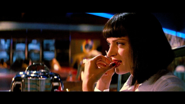 Woman eating pizza cityscape cinematic free wallpaper for desktop - medium preview image