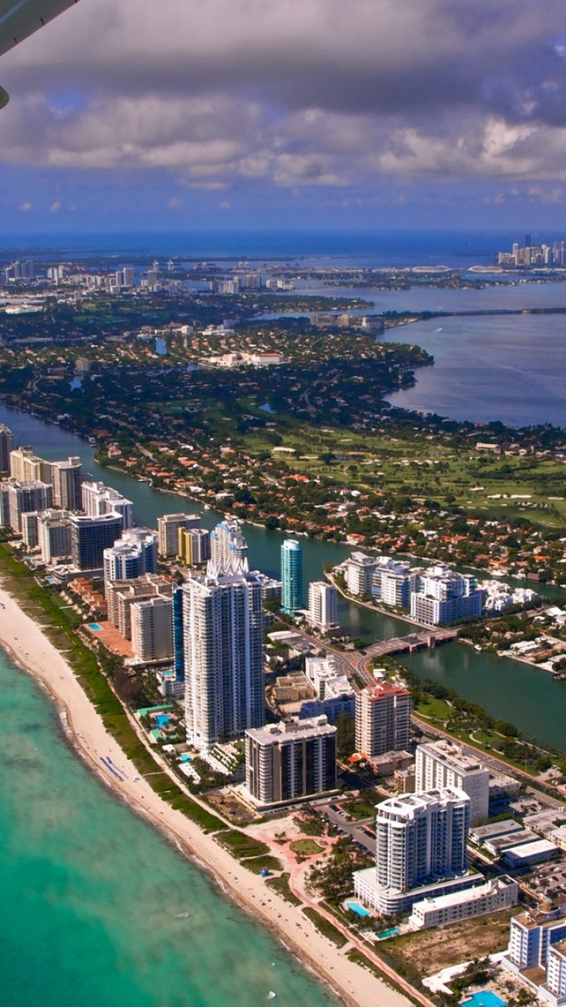 City view airplane ocean beach free wallpaper for mobile - medium preview image