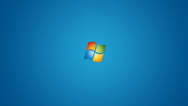 Blue background windows logo side free wallpaper for desktop - medium preview image