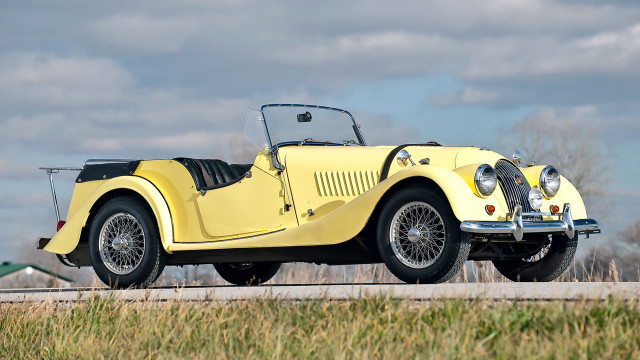 Yellow car parked road building free wallpaper for desktop - medium preview image