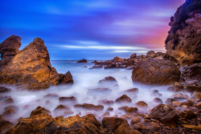 Rocky beach water cloudy sky free wallpaper for desktop - medium preview image
