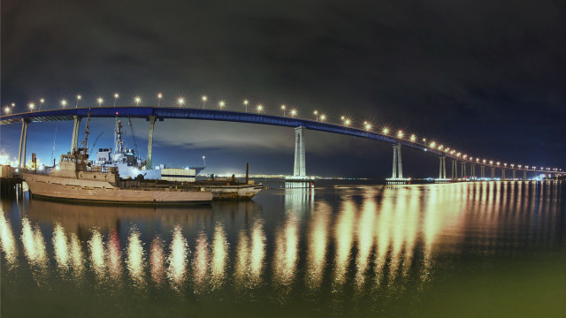 Boat docked water bridge night free wallpaper for desktop - medium preview image