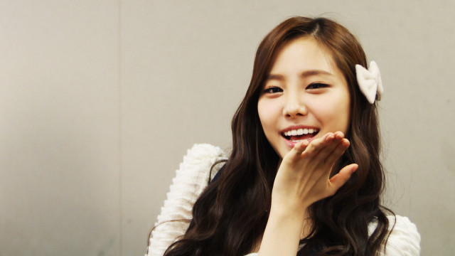 Woman long hair smiling hands free wallpaper for desktop - medium preview image