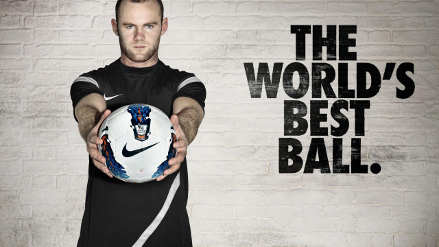 Man holding soccer ball worlds free wallpaper for desktop - medium preview image