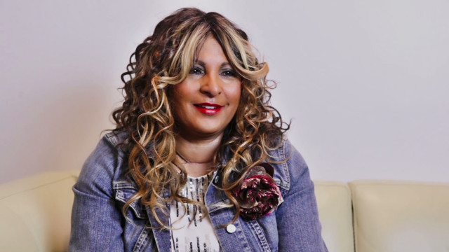 Woman curly hair couch flower free wallpaper for desktop - medium preview image