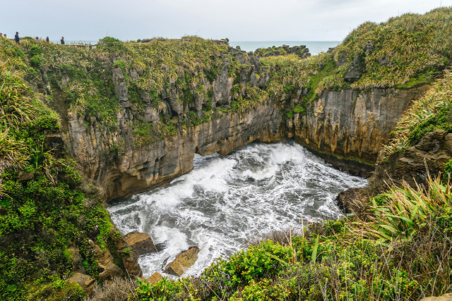 Large water vegetation cliffs cloudy free wallpaper for desktop - medium preview image