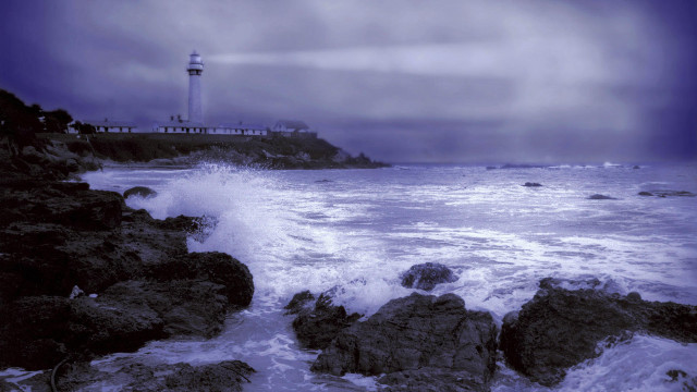 Lighthouse rocky shore wave crashing free wallpaper for desktop - medium preview image