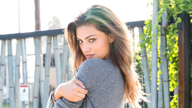 Woman longhair sweater jeans fence free wallpaper for desktop - medium preview image