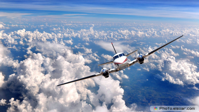 Small airplane flying above clouds #2 free wallpaper for desktop - medium preview image