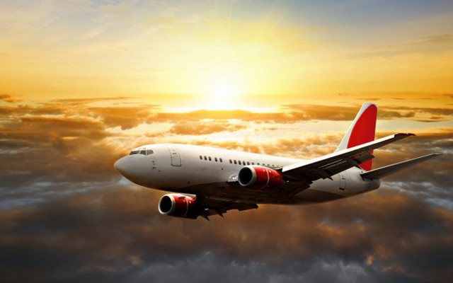 Jetliner cloudy sky sunset sun free wallpaper for desktop - medium preview image