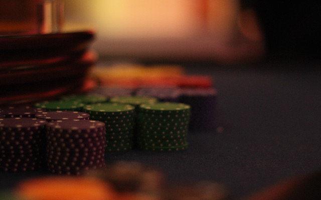Poker chips table cards person free wallpaper for desktop - medium preview image