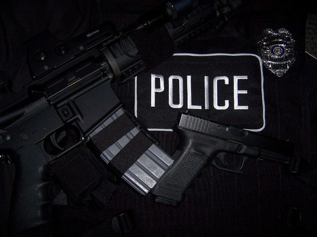 Police vest gun badge police free wallpaper for desktop - medium preview image