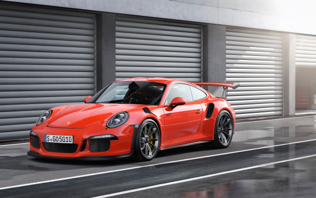 Red porsche gtr driving street free wallpaper for desktop - medium preview image