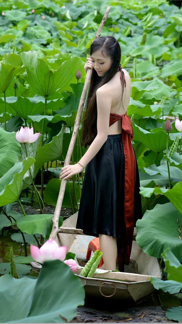 Woman boat field flowers stick free wallpaper for mobile - medium preview image